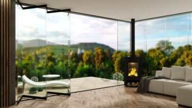 3D illustration. The facade of a modern forest villa patio with automatic black sliding doors and fireplace.