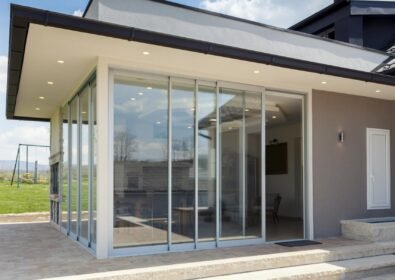 glazed terrace in the countryside with sliding glass